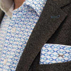 DressCode Shirts. Designs inspired by tech with pixels, binary, glitches and code brackets.